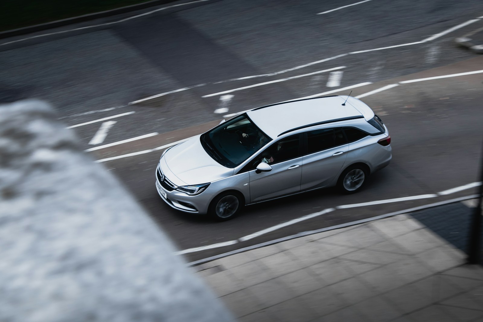 silver SUV traveling on concrete street Vauxhall