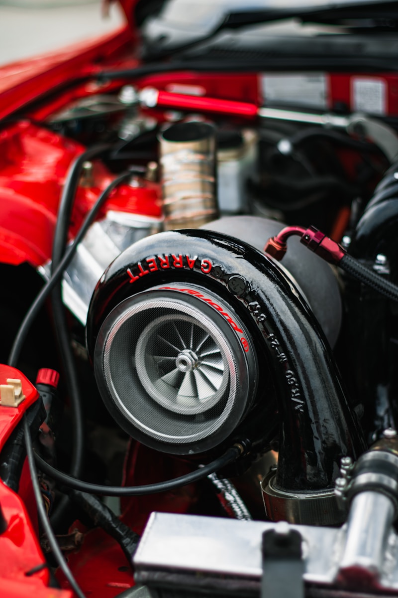 Photo by Simone Durelli black and red car wheel